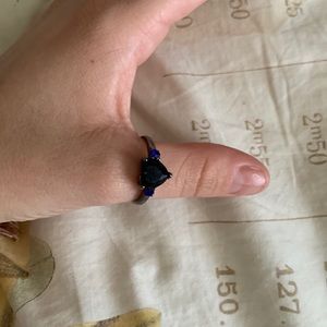 Blue and black heart ring